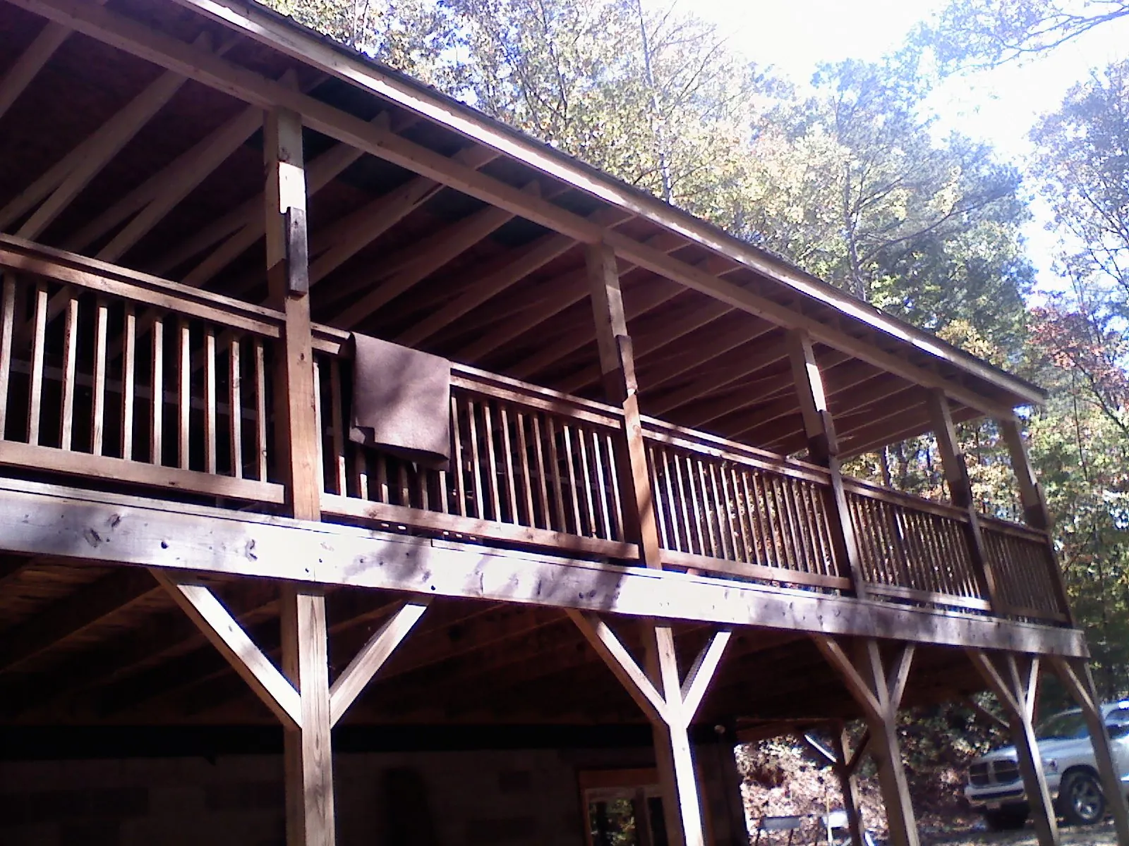 Timber framing under a new elevated porch and deck — Roof Leak Repair in Farmingdale by Roofing Brothers